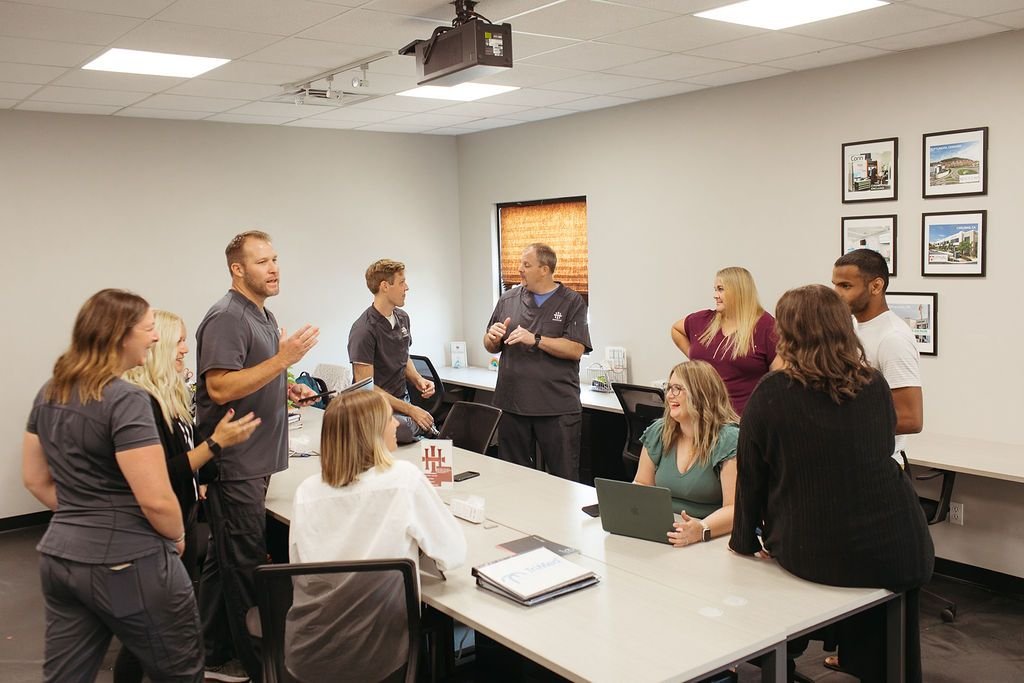 Orthopedic surgical team collaborating in the operating room